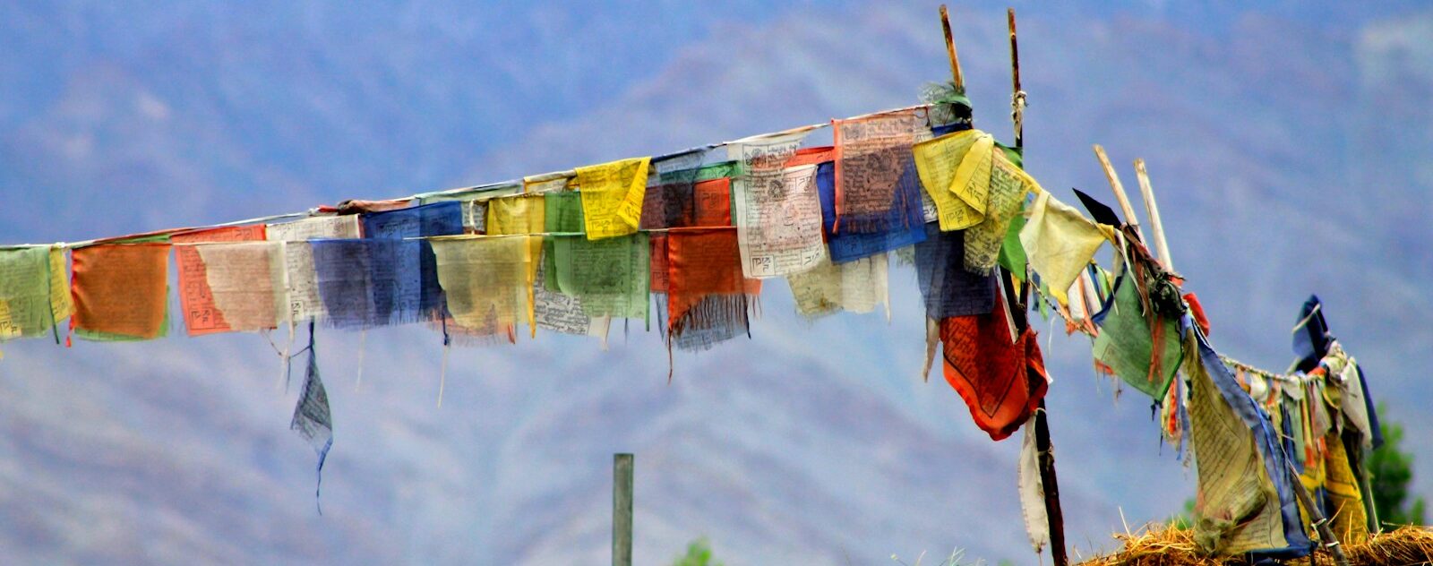 several textiles hanging on wire